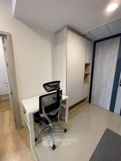 Modern study area with sleek desk and ergonomic chair in stylish apartment