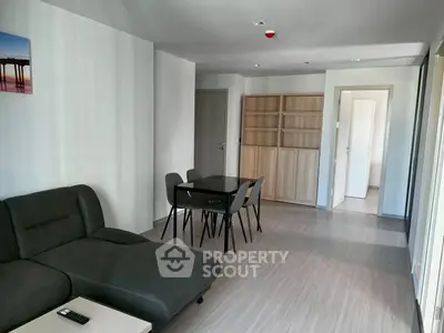 Modern living room with sleek furniture and open layout, perfect for relaxation and entertaining.