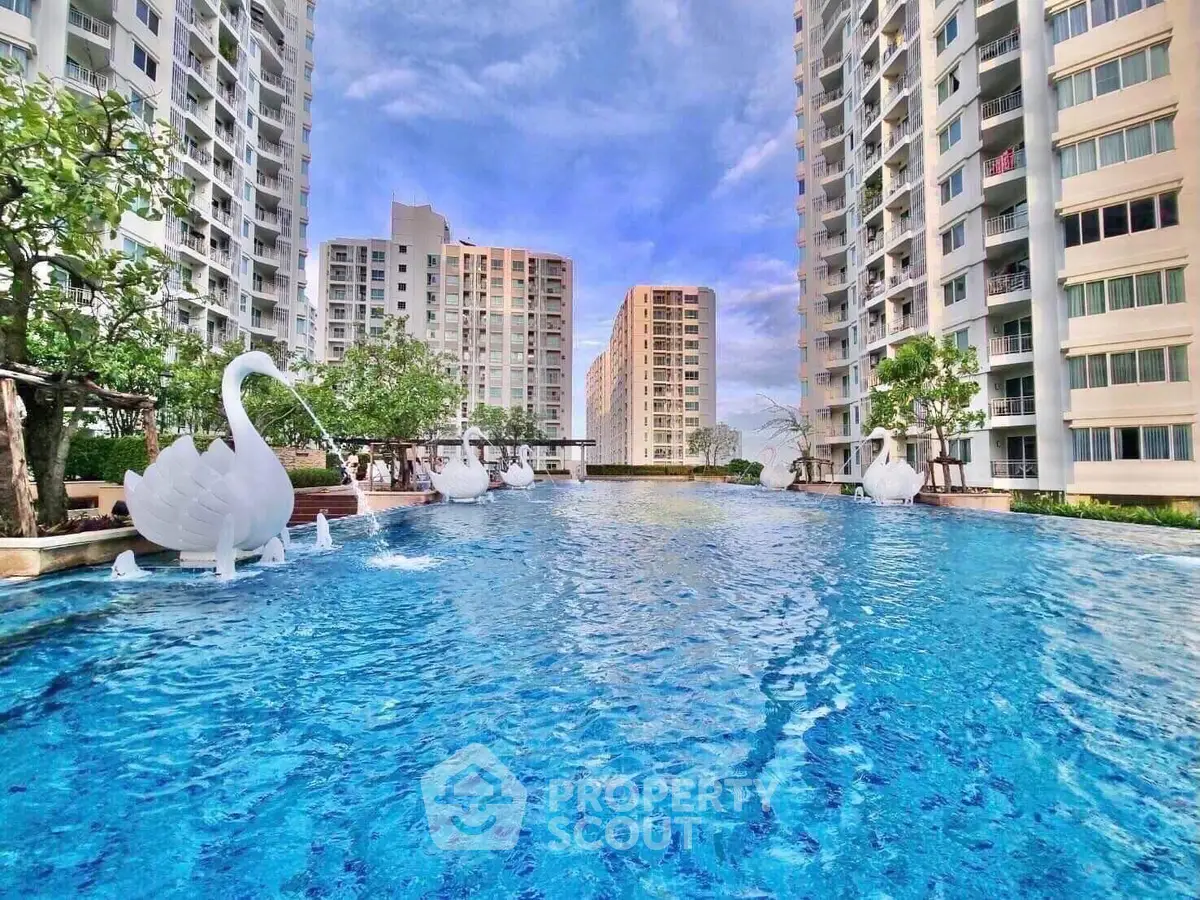 Luxurious residential complex with stunning pool and modern architecture