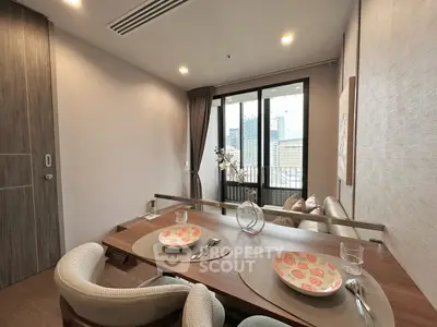 Modern dining area with city view, elegant decor, and cozy seating in urban apartment.