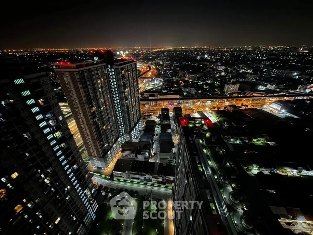Stunning cityscape night view from high-rise apartment balcony