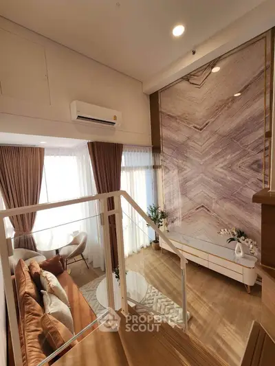 Luxurious duplex living room with elegant decor and natural light