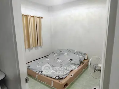 Cozy bedroom with minimalist decor and natural light