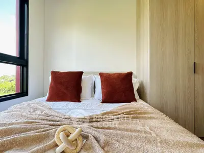 Cozy bedroom with natural light and stylish decor