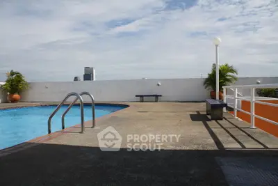 Stunning rooftop pool with city views and modern amenities, perfect for relaxation and leisure.