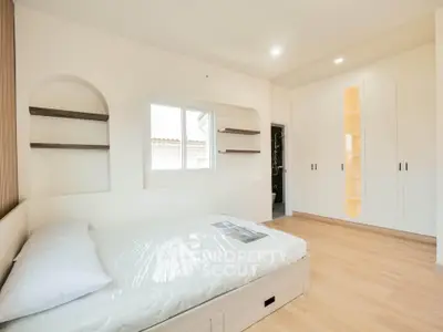 Spacious bedroom with modern design and built-in storage