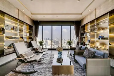 Luxurious living room with panoramic city view, modern decor, and elegant furnishings.