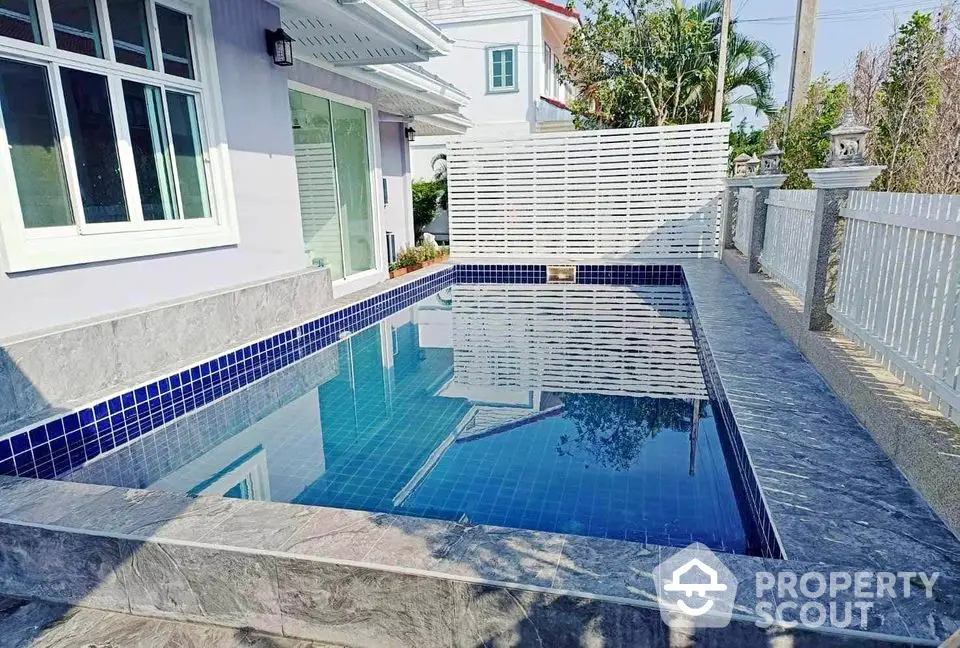 Charming residential property with a private pool and modern design, perfect for relaxation and entertainment.