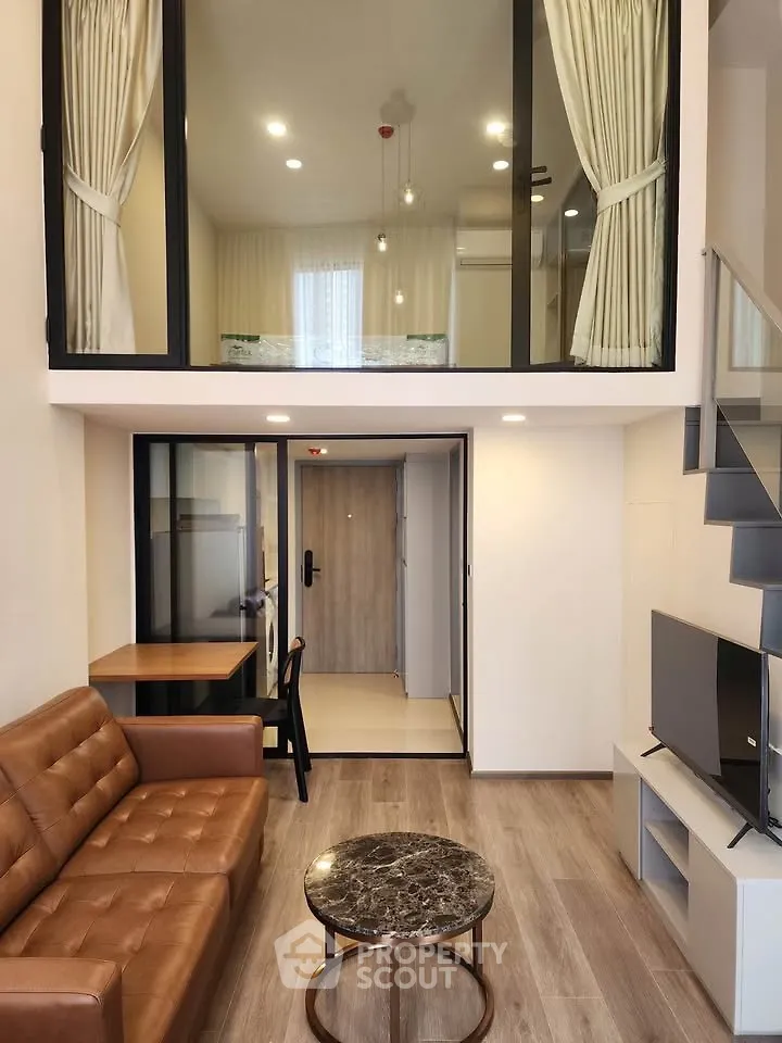 Modern loft apartment with stylish interior and mezzanine bedroom