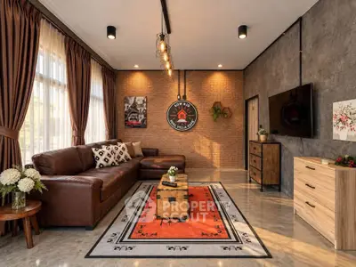 Stylish living room with leather sofa, modern decor, and ample natural light.