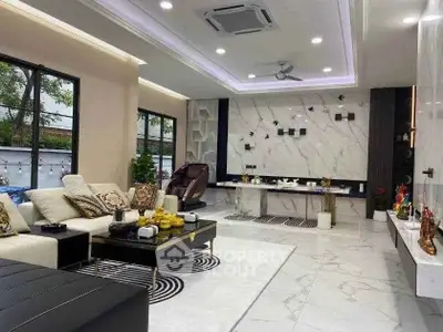 Luxurious modern living room with elegant marble accents and stylish decor