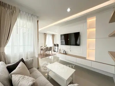 Modern living room with elegant decor and natural light