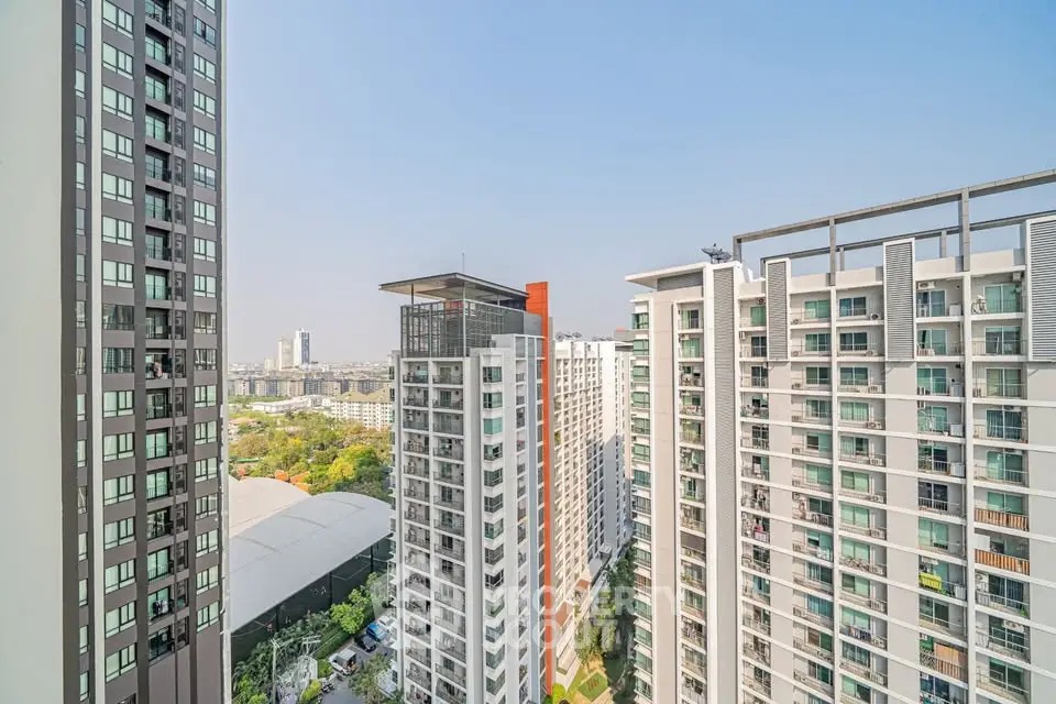 Stunning high-rise apartment buildings with panoramic city views and modern architecture.