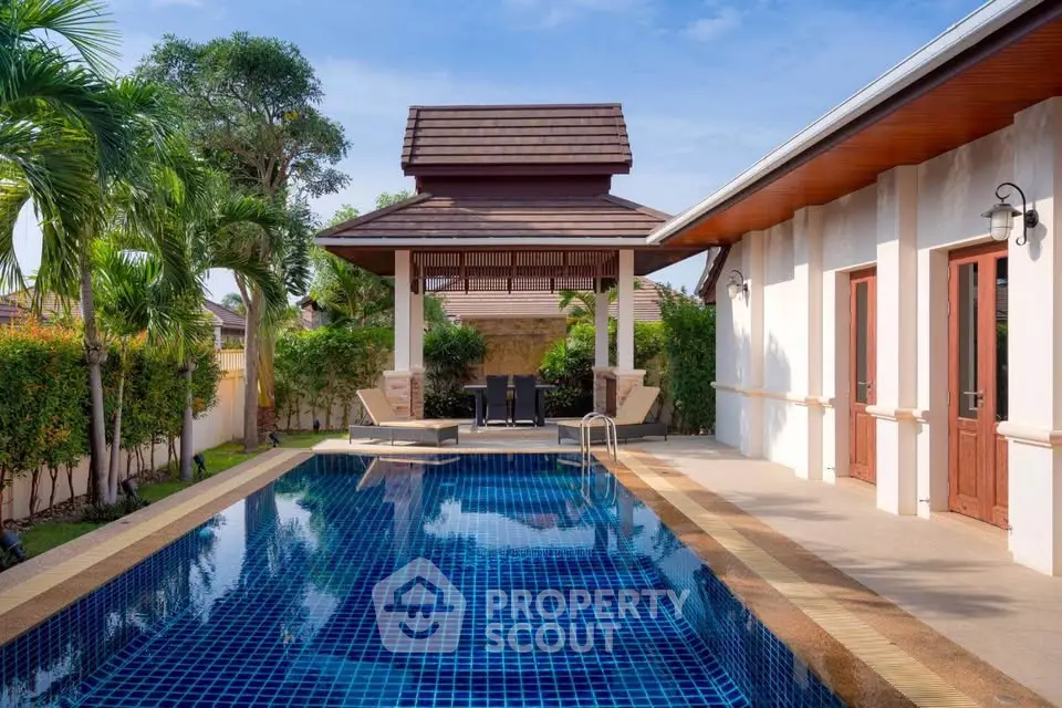 Luxurious villa with private pool and lush garden, perfect for relaxation and entertainment.