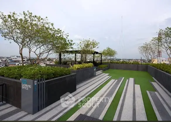 Stunning rooftop garden with modern design and panoramic city views.