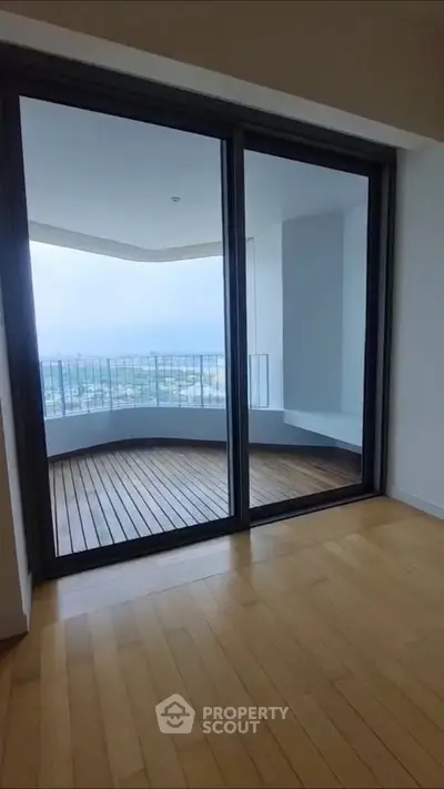 Spacious apartment with large balcony and stunning city view, perfect for modern living.