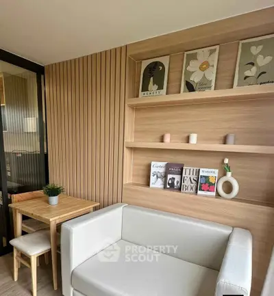Modern living room with stylish decor and cozy seating area, perfect for relaxation and entertainment.