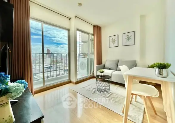 Bright modern living room with balcony and city view