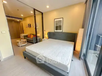 Modern bedroom with stylish decor and spacious layout in a contemporary apartment.