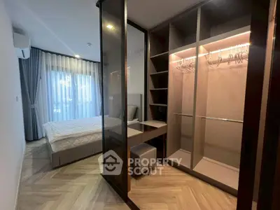 Modern bedroom with walk-in closet and elegant decor