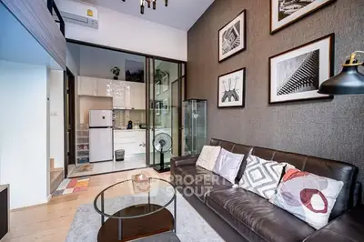 Modern living room with stylish decor and open kitchen layout