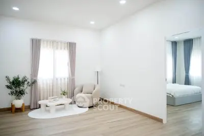 Spacious modern living room with elegant decor and natural light