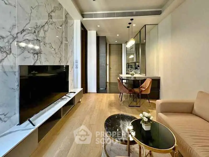 Modern living room with marble accent wall and stylish furniture