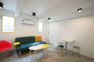 Modern living room with colorful furniture and minimalist design