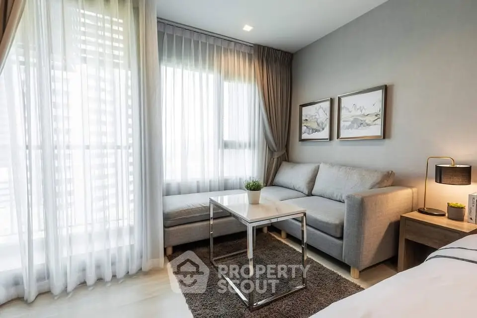Modern living room with cozy sofa and elegant decor