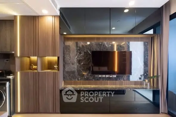Luxurious modern living room with sleek wood paneling and marble accents, featuring a mounted flat-screen TV.
