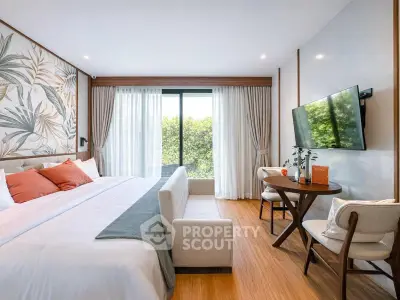 Luxurious bedroom with elegant decor, large window, and modern furnishings