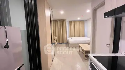 Modern studio apartment with open layout and stylish furnishings