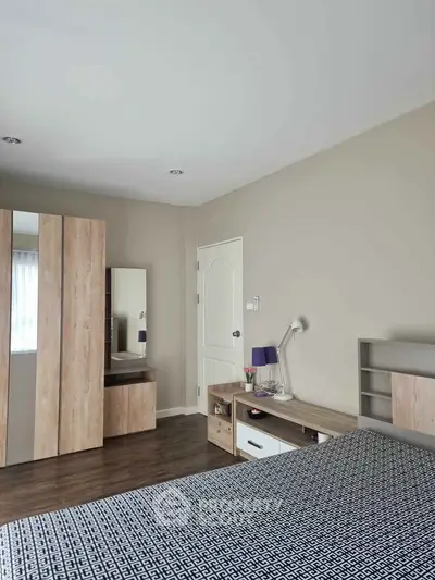 Modern bedroom with stylish wooden furniture and elegant decor