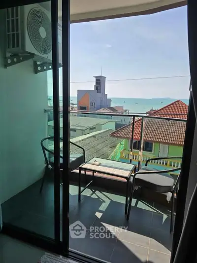 Charming balcony with ocean view, perfect for relaxation and enjoying the sea breeze.