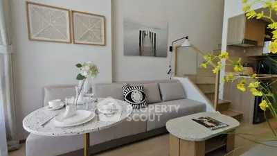 Stylish modern living room with elegant decor and cozy seating area, perfect for relaxation and entertaining.