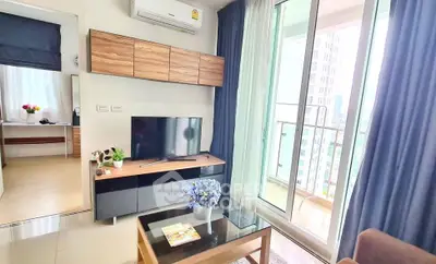 Modern living room with balcony view in high-rise apartment