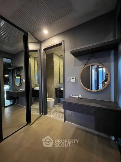 Modern bathroom with stylish mirror and sleek design
