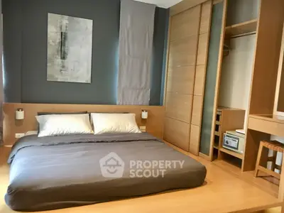 Modern bedroom with sleek wooden accents and built-in storage