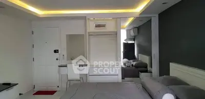 Modern bedroom with sleek design and ambient lighting