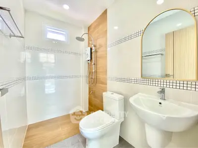 Modern bathroom with sleek fixtures and stylish tile design