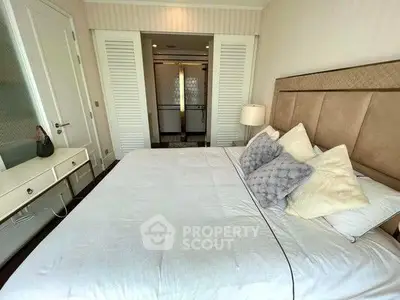 Luxurious bedroom with plush bedding and elegant decor