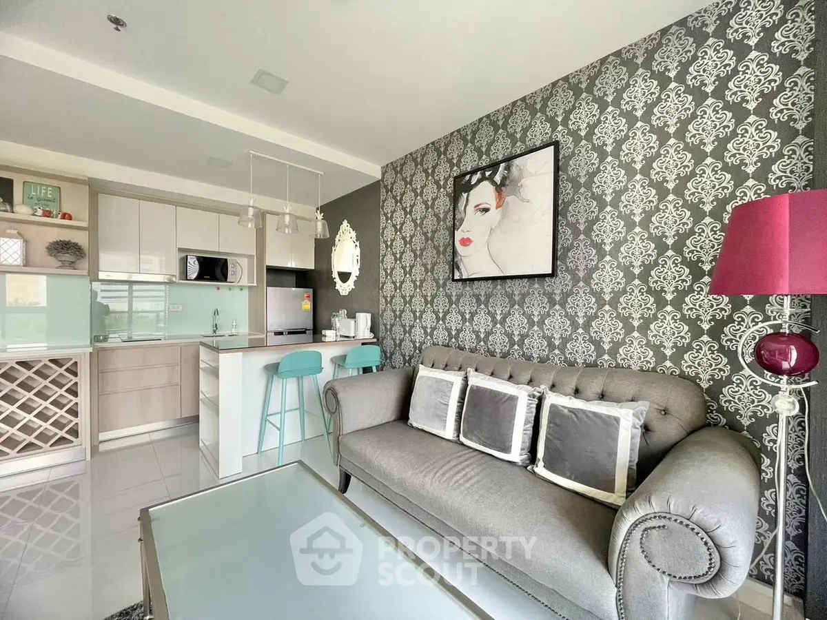 Stylish modern living room with elegant decor and open kitchen layout