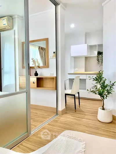 Modern apartment interior with wooden flooring and stylish decor