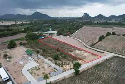 Expansive plot of land with scenic mountain views, ideal for development opportunities.