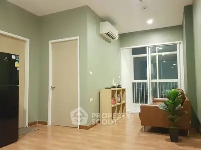 Modern living room with air conditioning and balcony view