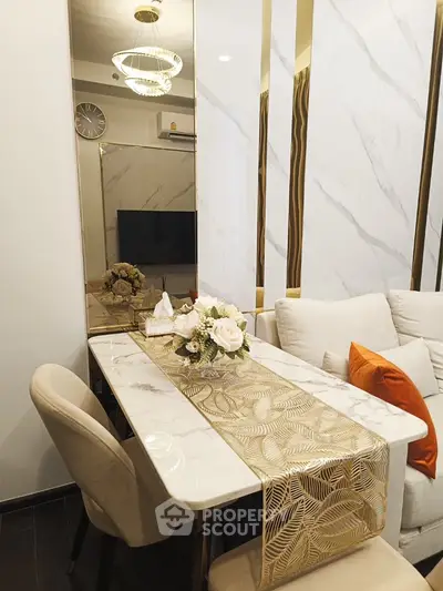 Elegant living room with modern decor and stylish dining area