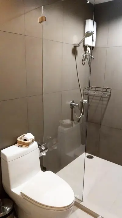 Modern bathroom with glass shower and sleek fixtures