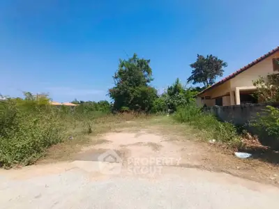 Spacious vacant land with potential for development in a serene neighborhood.