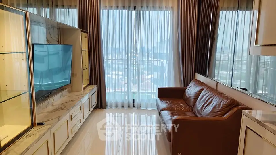 Luxurious living room with leather sofa and city view through large windows