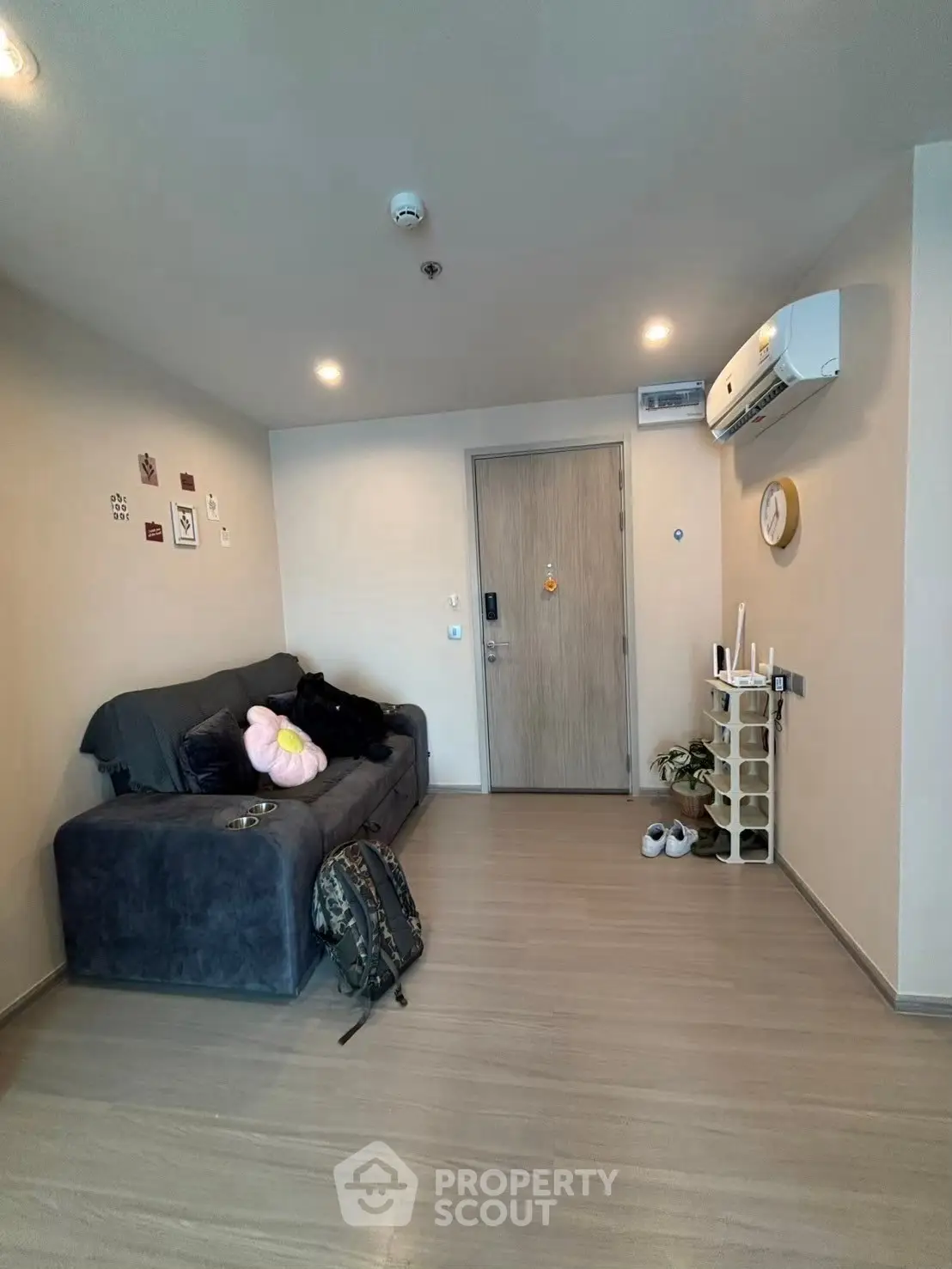 Cozy living room with modern decor and air conditioning